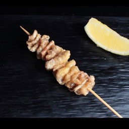 หนังไก่เสียบไม้ย่าง