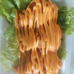 ปีกไก่บนทอดราดชีสดิป