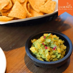 PINEAPPLE GUACAMOLE- Served with fresh fried corn chips
