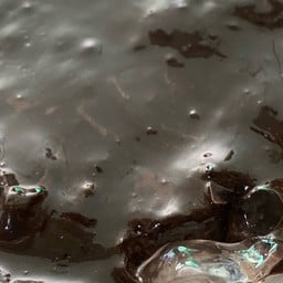 นมเหนียวแก้วโอ่ง ร้านOUAN JU