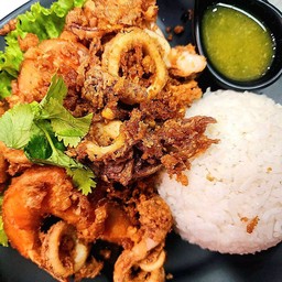 Fried Seafood With Garlic On Rice