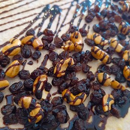 ลูกเกด+เม็ดมะม่วง ราดช็อคโกแลต