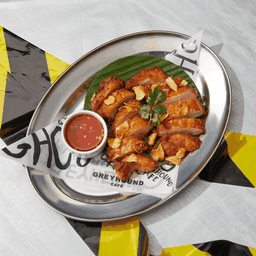 สะโพกไก่ทอดซอสน้ำปลา