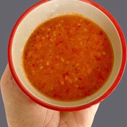 น้ำจิ้มแดงสามรสผสมถั่ว ถุงละ