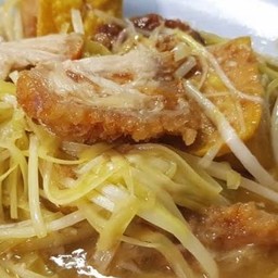 ผัดกุ๋ยช่ายขาวเต้าหู้หมูกรอบ