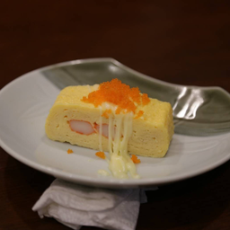 ไข่หวานไส้ปูอัดราดน้ำสลัด