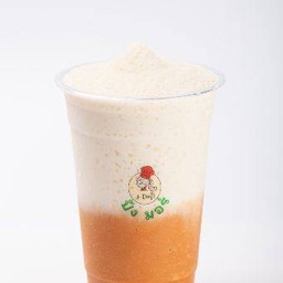 สเลอปี้ ทูโทน (นมสด-ชาไทย) อาจไม่แยกชั้นแบบรูป เนื่องจากการเขย่าระหว่างการขนส่ง