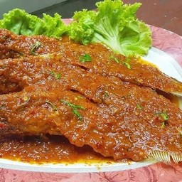 Fried Sheatfish Top With Sweet And Sour Sauce
