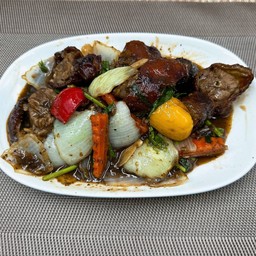 คอเป็ดย่างผัดพริกไทยดำ