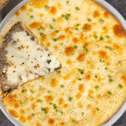 Puccia with Cheese & Truffle (พิซซ่าแซนวิชสอดไส้ชีสบูร์ราตาและทรัฟเฟิล)
