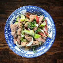 ยำคอหมูย่าง (Spicy grilled pork salad)