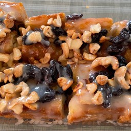 ขนมปังปิ้งเนยนม ลูกเกด+เม็ดมะม่วง ใหญ่2ชิ้น