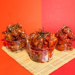 ไก่ทอดคลุกซอส