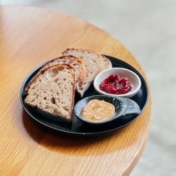 Sourdough Slice With Nut Butter And Raspberry