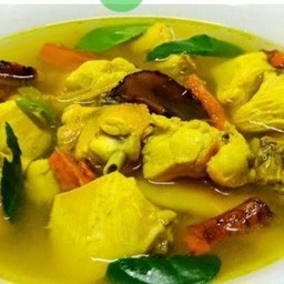 ไก่ต้มขมิ้นราดข้าว