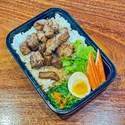 Dข้าวสันคอหมูเต๋าผัดเนยกระเทียม