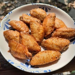 ปีกไก่กลางทอดน้ำปลาสูตรเด็ด 4 ชิ้น