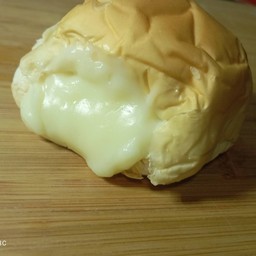 ขนมปังก้อนปิ้ง ไส้นม 1 ชิ้น