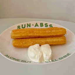 TRUFFLE CHURROS ( Free 1 dipping Sauce )