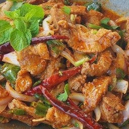Spicy thai salad with grilled roasted pork, shallot, spring onion and chili