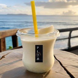 มะพร้าวปั่นนมสด (COCONUT MILK SMOOTHIE 22 OZ)