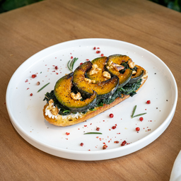 Homemade sourdough with pumpkin , spinash , cream cheese  and walnut