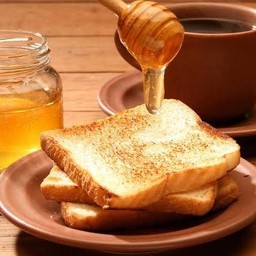 ขนมปังปิ้งเนย-น้ำผึ้ง คู่ละ