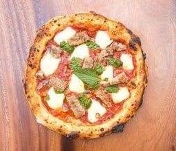 Spicy Italian Sausage Kra Prow Pizza Slice