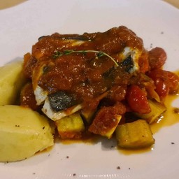 Baked wild caught in Mediterranean sauce