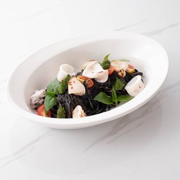 Squid ink sauce with grilled pesto calamari