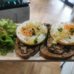 ST 1 Sunny side egg, sauteed mushroom, garlic butter sauce