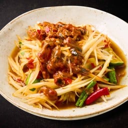 Spicy papaya salad with pickled mussels and fermented fish sauce
