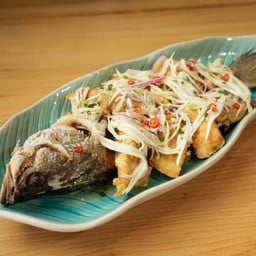 Deep fried sea bass with spicy mango salad
