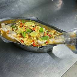 Steamed Sea bass with Lemon Sauce ปลากระพงนึ่งมะนาว