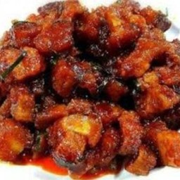 ผัดเครื่องแกงหมูกรอบราดข้าว