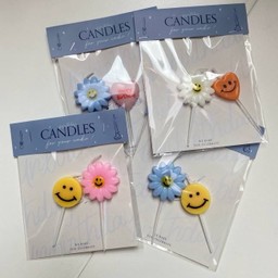 Daisy smiley candle