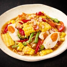 Papaya salad with corn and salted eggs