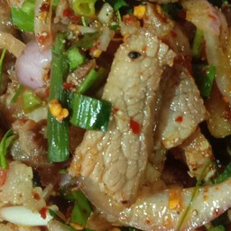 Grilled pork salad with spicy dipping sauce and fresh herbs