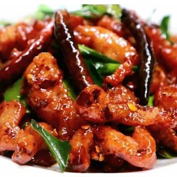 ผัดพริกแกงไก่ทอดราดข้าว