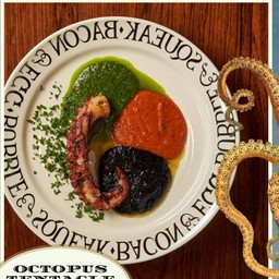 Octopus Tentacle with rocket pesto + capsicum puree + black ink