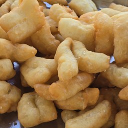 โก๋เล็ก 15 ชิ้น รีบฟรีท้อปปิ้ง 1 กะปุก