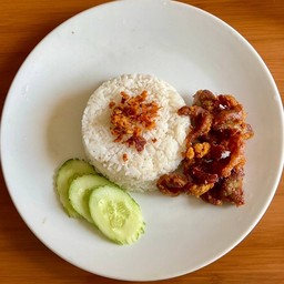 สันคอหมูทอดขมิ้นราดข้าว