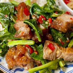 Stir Fried Kale With Crispy Pork On Rice