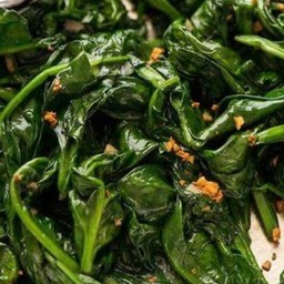 ท๊อปปิ้งผักโขมผัด