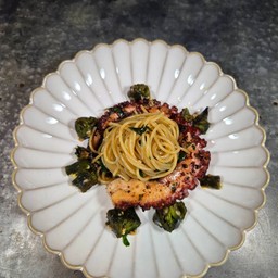 Octopus tentacle garlic butter pasta