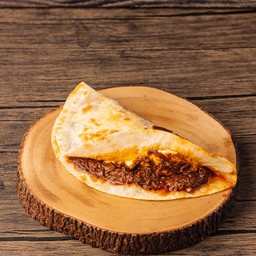 Gringa de Boda Quesedillas (Pork in Adobo Mole)