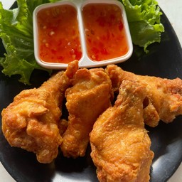 ปีกบนทอด