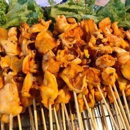 หมึกย่างข้างคลอง