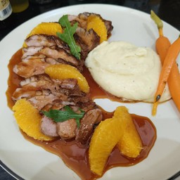 Duck breast, orange sauce with mash