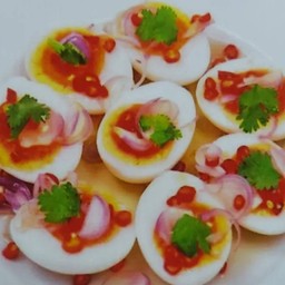 ยำไข่ต้มยางมะตูม